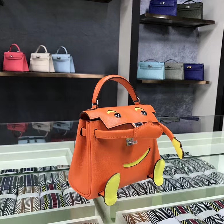 Hermes爱马仕 罂粟橘色拼柠檬黄 Swift 皮 Kelly doll 银扣
