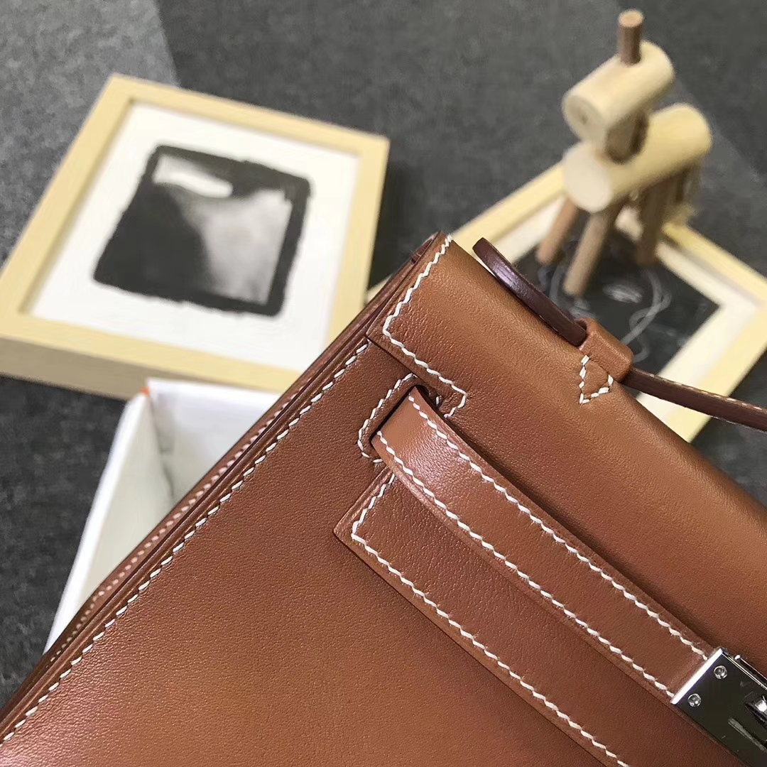 Hermès（爱马仕）金棕色 原厂御用顶级Swift 皮 Mini Kelly 银扣