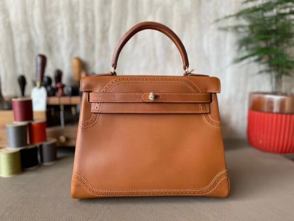 Hermès（爱马仕）Kelly 凯莉包 蕾丝 金棕色 平纹马鞍皮 金扣 28cm
