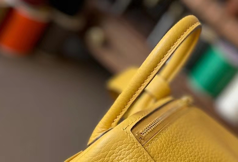 Hermès（爱马仕）Mini Lindy 迷你琳迪包 琥珀黄 TC大牛皮 金扣 20cm