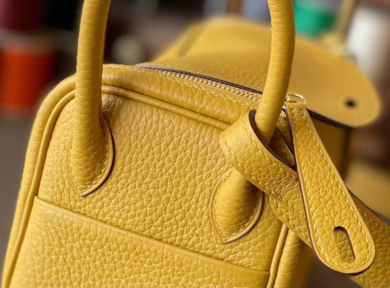 Hermès（爱马仕）Mini Lindy 迷你琳迪包 琥珀黄 TC大牛皮 金扣 20cm
