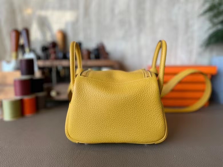 Hermès（爱马仕）Mini Lindy 迷你琳迪包 琥珀黄 TC大牛皮 金扣 20cm